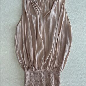 Ramy Brooke Elegant Sleeveless Blouse in pinkish nude color.